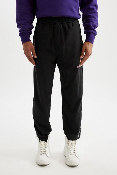 DeFacto Nba Los Angeles Lakers Pocketed Extra Tight Leg Slim Fit Sports Sweatpants