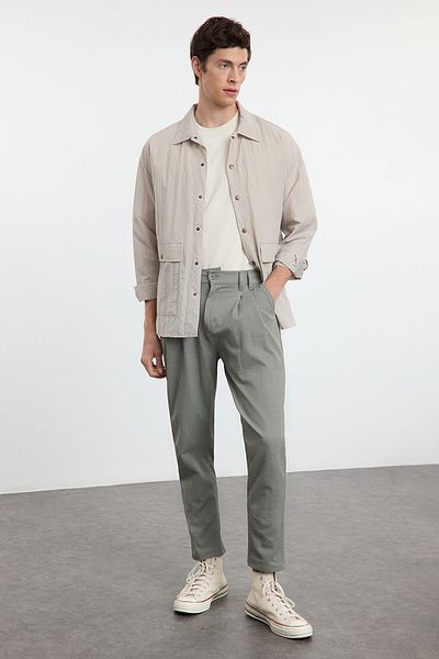 Trendyol Collection Bequeme, dehnbare Khaki-Strickhose – Karottenschnitt TMNAW25PL00016