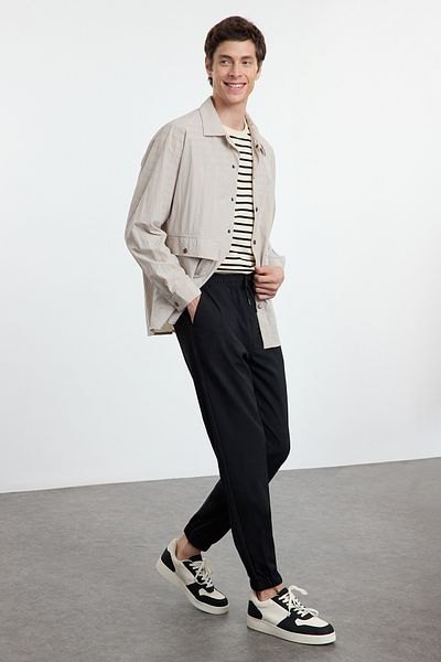 Trendyol Collection Μαύρο παντελόνι Jogger Slim Fit με δέσιμο στη μέση ελαστικό ύφασμα TMNAW25PL00000