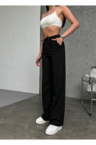 veres Dámské černé proužkované 2 vláknové široké tepláky