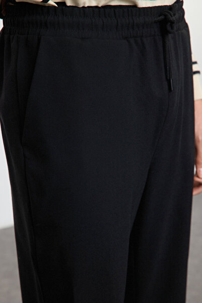 Trendyol Collection Black Slim Fit Jogger Elastic Fabric Trousers with Tie Waist Tmnaw25Pl00000