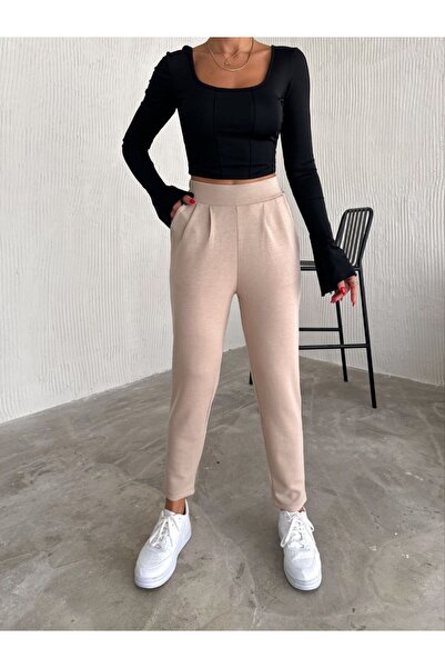 SUYA US WEAR Штани з високою талією та гумкою на талії з піщаного кольору тка...