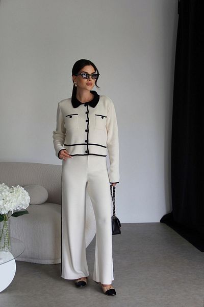 Julidress طقم تريكو فاخر - سترة وسروال بياقة بولو باللون الأبيض والأسود