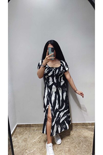 Nida Çelik Collection Kare yaka yırtmaçlı elbiseler