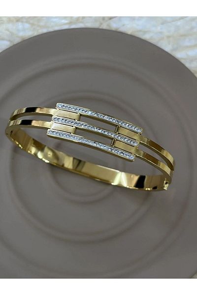 stainless steell سوار فولاذي ذهبي اللون