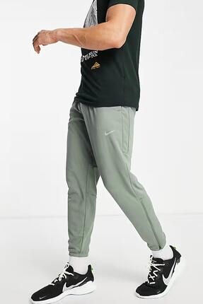 Nike essential men's woven running trousers top