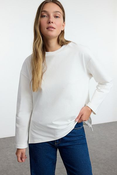 Trendyol Collection Bequeme Passform, weiße Langarm-Strickbluse mit Schlitz - Twoaw25bz00266
