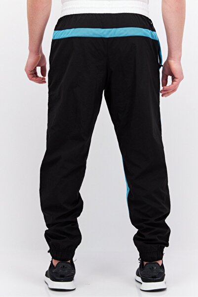 Puma Men Brand Logo Outdoor Track Pant, Black Combo