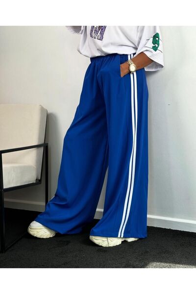 Machetta Жіночі спортивні штани з широкими штанинами в бічну смужку