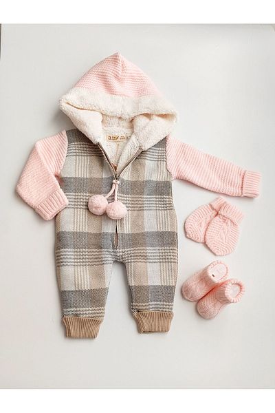 a baby Merino Lined Lamb Pompom Jumpsuit