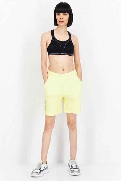 Puma Women Sportswear Fit Plain Training Shorts, Yellow