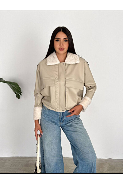 jöns since 1997 سترة نسائية من الجلد باللون الكريمي مع غطاء وجيوب وفراء من ال...