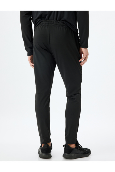 Koton Sportliche Jogginghose mit Schnürung und Taschendetail an der Taille