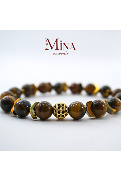 Mina Souvenir عين النمر (الطاقة، الشجاعة، الذهن) وسوار حجر الهيماتيت (التوازن).