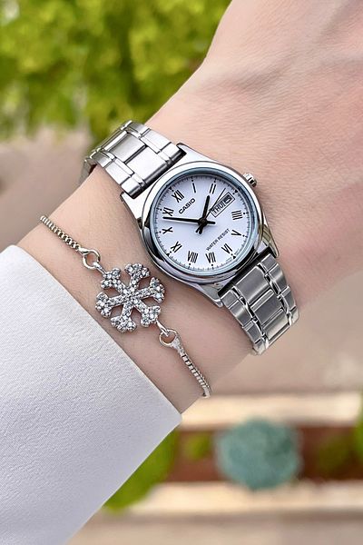 Casio Women's Wristwatch with Dial White Cord Metallic Calendar 24 Months Guarantee