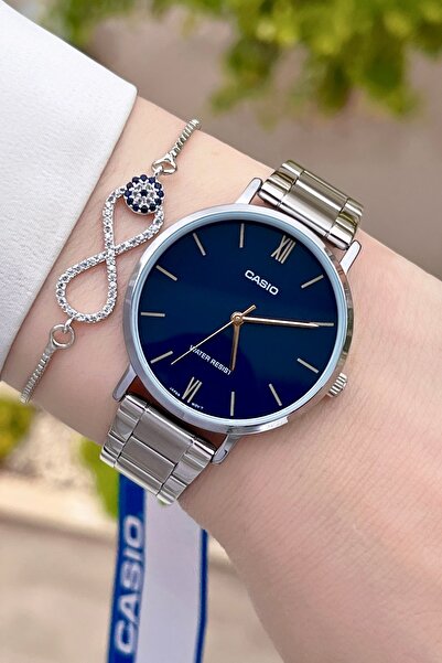 Casio Women's Wristwatch with Navy Blue Dial and Metallic Color Band, 24 Months Warranty