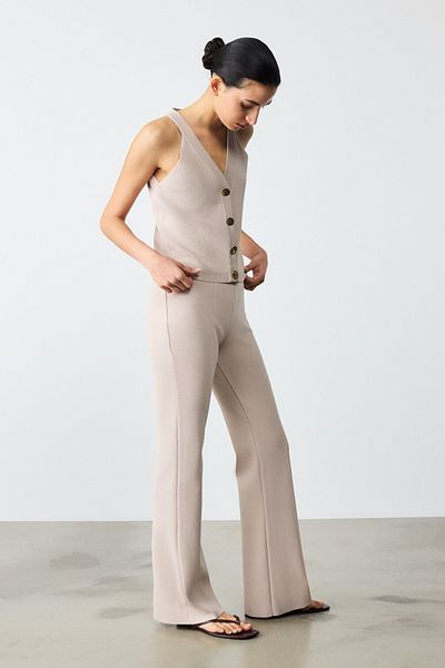 Mısırlı Pantaloni de damă bej - cu nervuri evazate