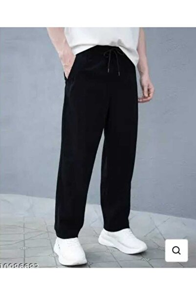 UYN SPORT بدلة رياضية سوداء مريحة فضفاضة - 4 - ساق مستقيمة