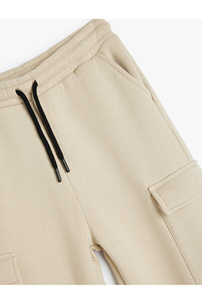 Koton Бігові плавки з карманними кишенями та поясом на шнурках