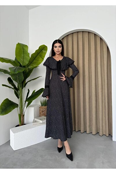 conconmoda Puntíkované designové šaty se stuhou