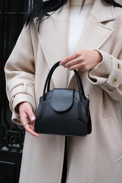 Madamra Schwarze Mini-City-Tasche für Damen mit Überzug