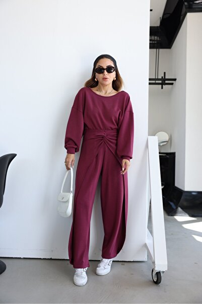 Özge Özgenç بلوزة مشروط بأكمام طويلة وظهر منخفض