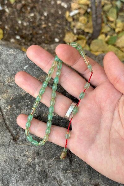 TESBİHKENTİ Mărgele de rugăciune de chihlimbar strânse până la încheietura mâ...