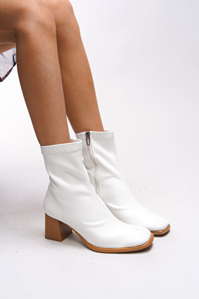 Riccon Білі жіночі чобітки на підборах з еластичною вставкою Laezaen