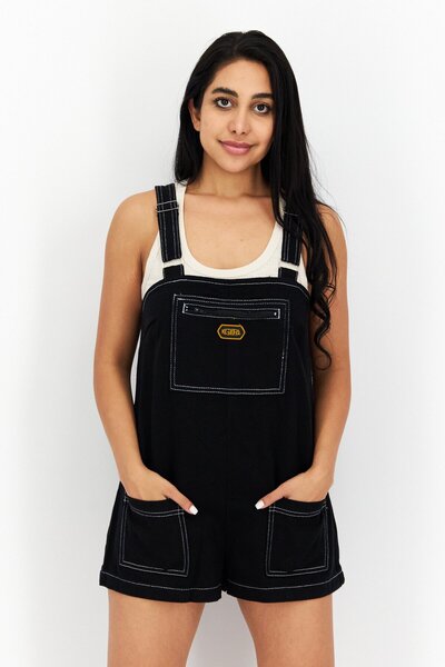 X-Girl بدلة لعب نسائية بدون أكمام بشعار العلامة التجارية، باللون الأسود