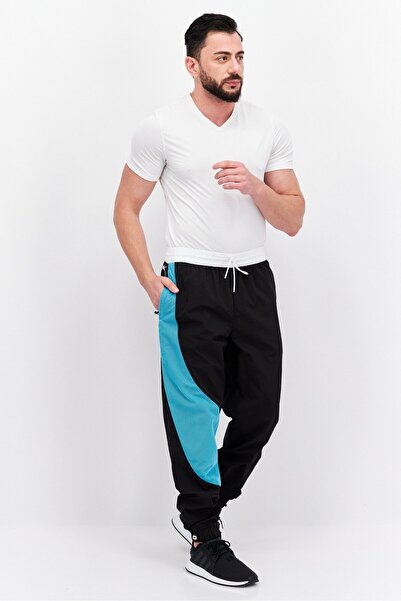 Puma Men Brand Logo Outdoor Track Pant, Black Combo