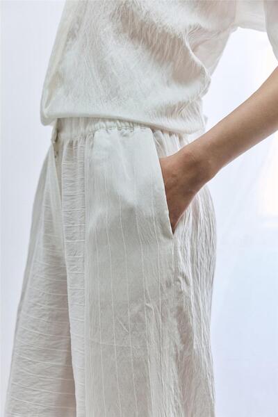 SHERIN Ecru Wrinkled Look Trousers