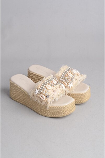 SEÇ KUNDURA اختر 16 شبشب من الجلد الأصلي بكعب منصة باللون البيج