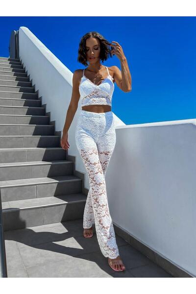 DEEP SECRET Flared Leg Lace Trousers