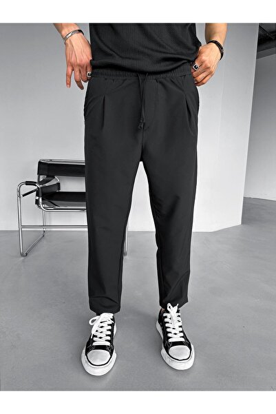 ablukaonline Férfi normál szabású ejtőernyős szövet nadrág fekete