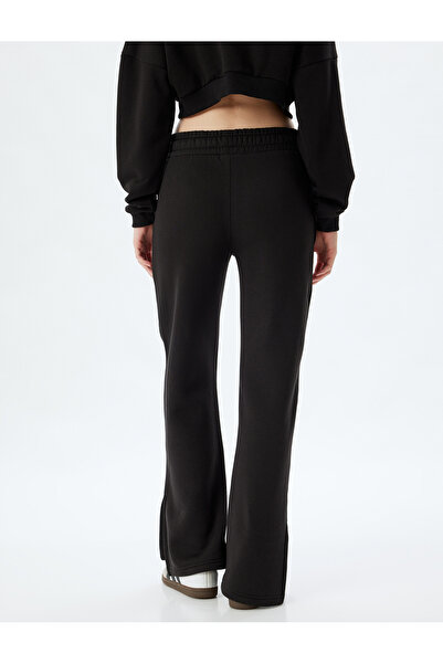 Koton Bol Paça Eşofman Altı Beli Lastikli Yırtmaç Detaylı Yüksek Bel Şardonlu Cepli