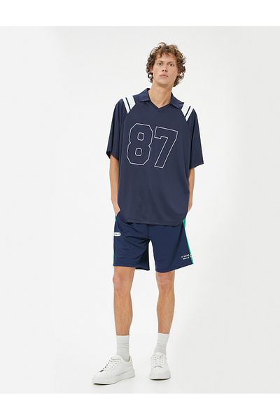 Koton Sportshorts mit Slogan-Aufdruck, Taillenschnürung, Streifendetail und Taschen