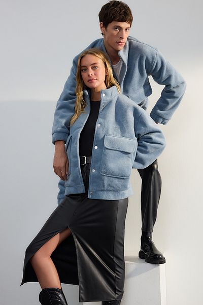 Trendyol Collection Limitovaná edice - Modrý měkký zimní kabát Regular Fit Tmnaw25mo00034 s stojáčkem a detailem kapsy