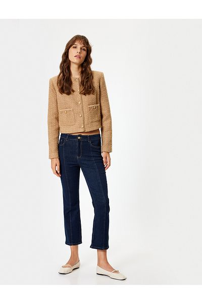 Koton Schmal geschnittene, ausgestellte Crop-Jeans mit niedriger Taille und Nahtdetails