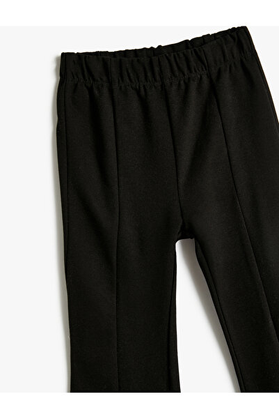 Koton İspanyol Paça Pantolon Fitilli Yırtmaç Detaylı Beli Lastikli