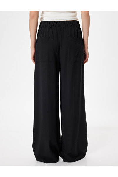Koton Beli Lastikli Bağlamalı Cepli Geniş Paça Viskon Pantolon