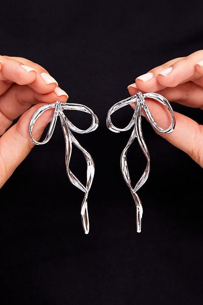Elika Silver Women's Flashy Bow Model Earrings