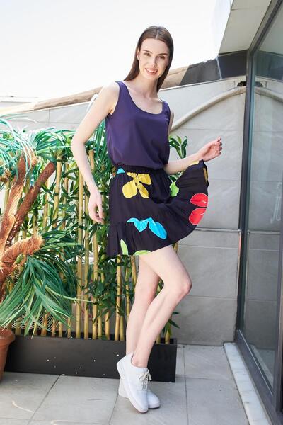 Jument Міні-спідниця з високою талією і воланами - темно-синя з квітковим візерунком