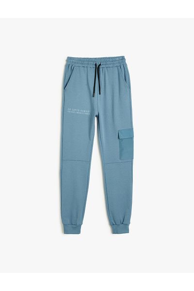 Koton Παντελόνι Jogger με δέσιμο στη μέση με λεπτομέρεια από βαμβακερή τσέπη