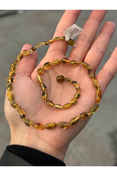 KEHRİBAREVİ KARAMAN Damla Kehribar Yetişkin Kolye Yassı Fosilli Model