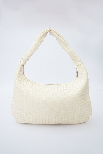 Manuka Beigefarbene große gestrickte Frances-Tasche