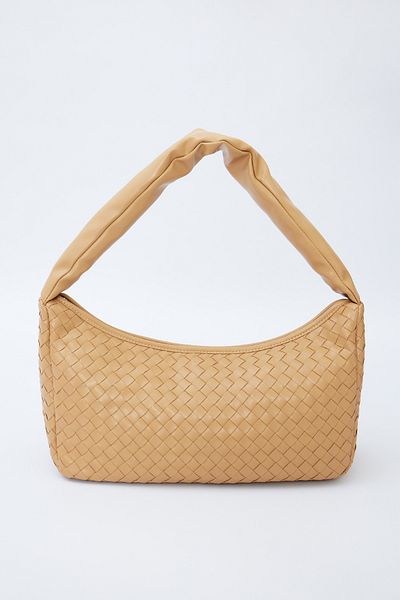 Manuka Frances Milchkaffeefarbene gestrickte ovale Tasche