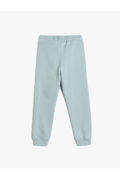 Koton Jogginghose mit College-Print und erhabenem Muster – Bindegürtel in der Taille und Taschendetails