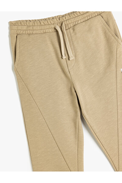 Koton Bavlněné tepláky Jogger - zavazovací pas a stuha