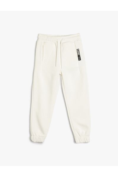 Koton Cotton Blended Jogger Sweatpants - Slogan Printed, Lace-up Waist and Pocket Detail