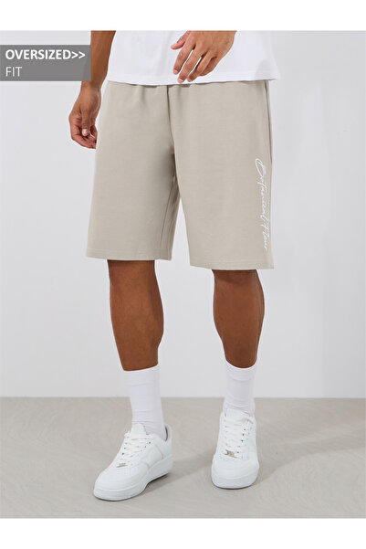 Styli شورت كبير الحجم مطرز بشعارات